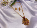 Haaram Antique Matte Gold Lakshmi Pendant Long Necklace Set with Earrings